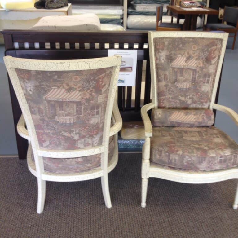 Two vintage upholstered chairs with floral pattern