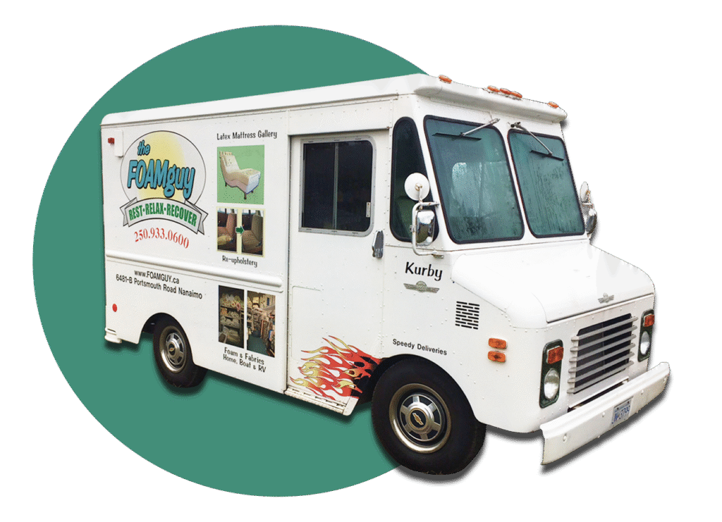 Foam delivery truck with vibrant logo and contact details.