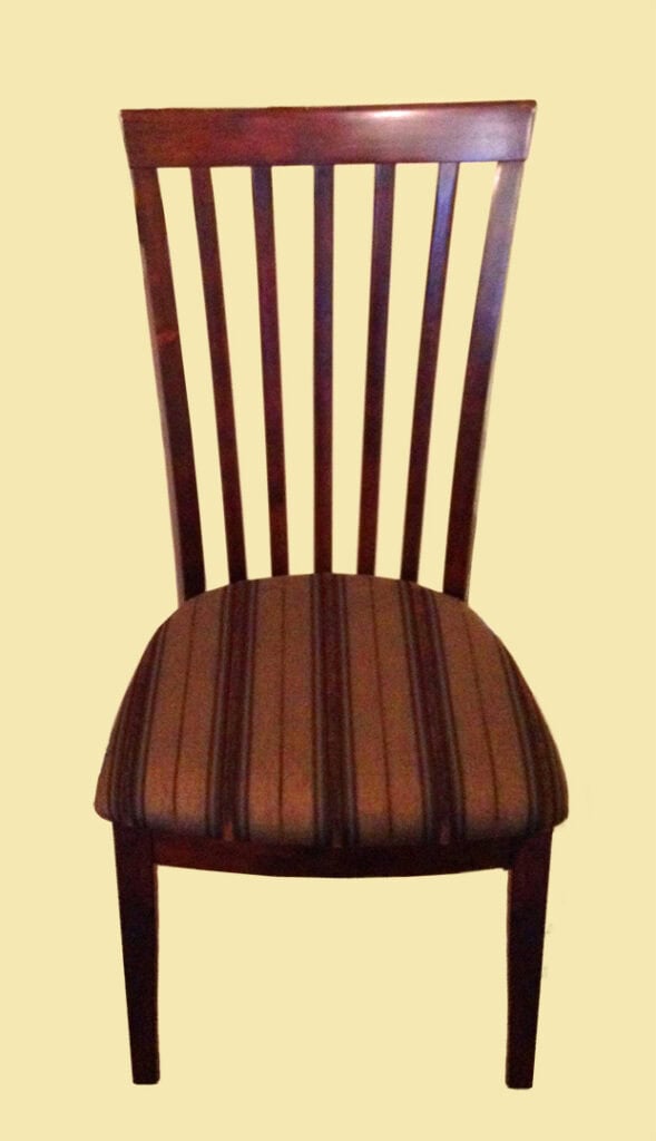 Wooden chair with cushioned seat and vertical slats.