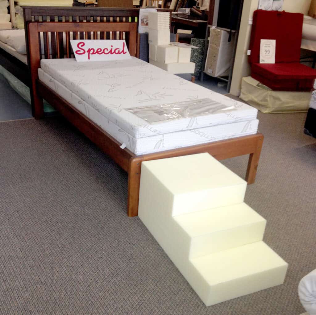 Single bed with mattress and foam steps on sale.